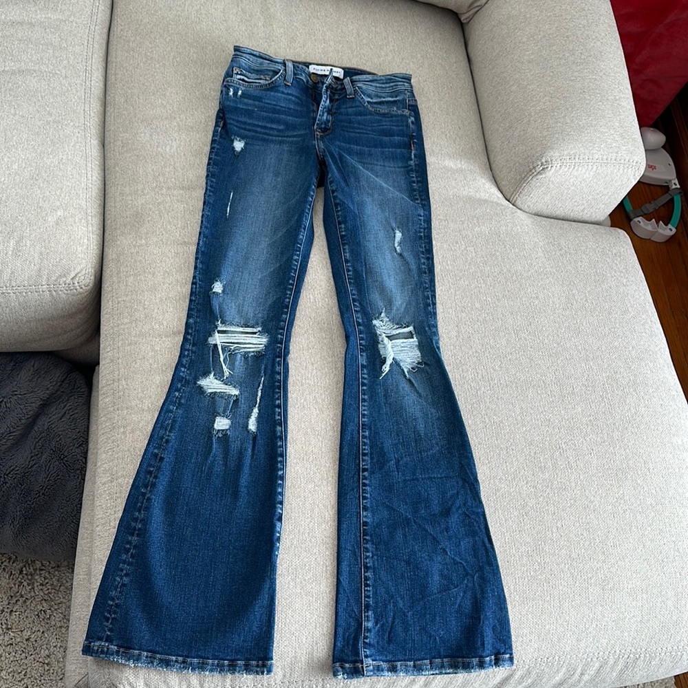 Flying Monkey distressed flare jeans. 25
